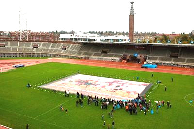 A huge jigsaw mosaic depicting top-flight Dutch footballers in a stadium in Amsterdam
